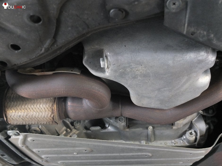 location of engine oil drain bolt
