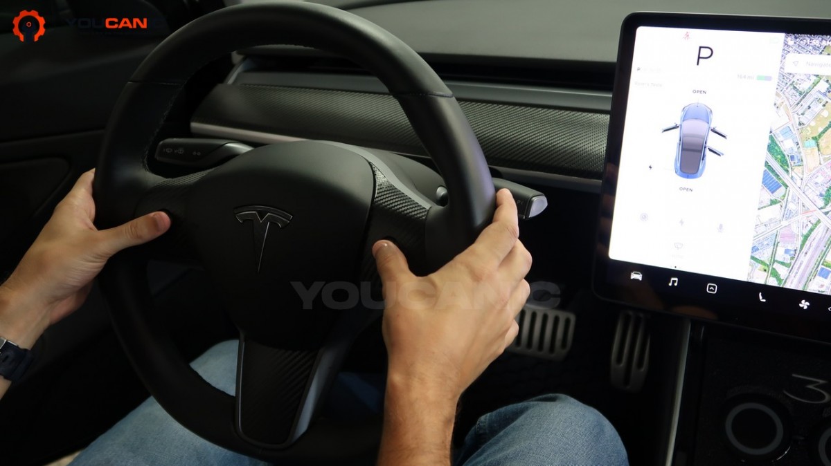 reset reboot tesla vehicle