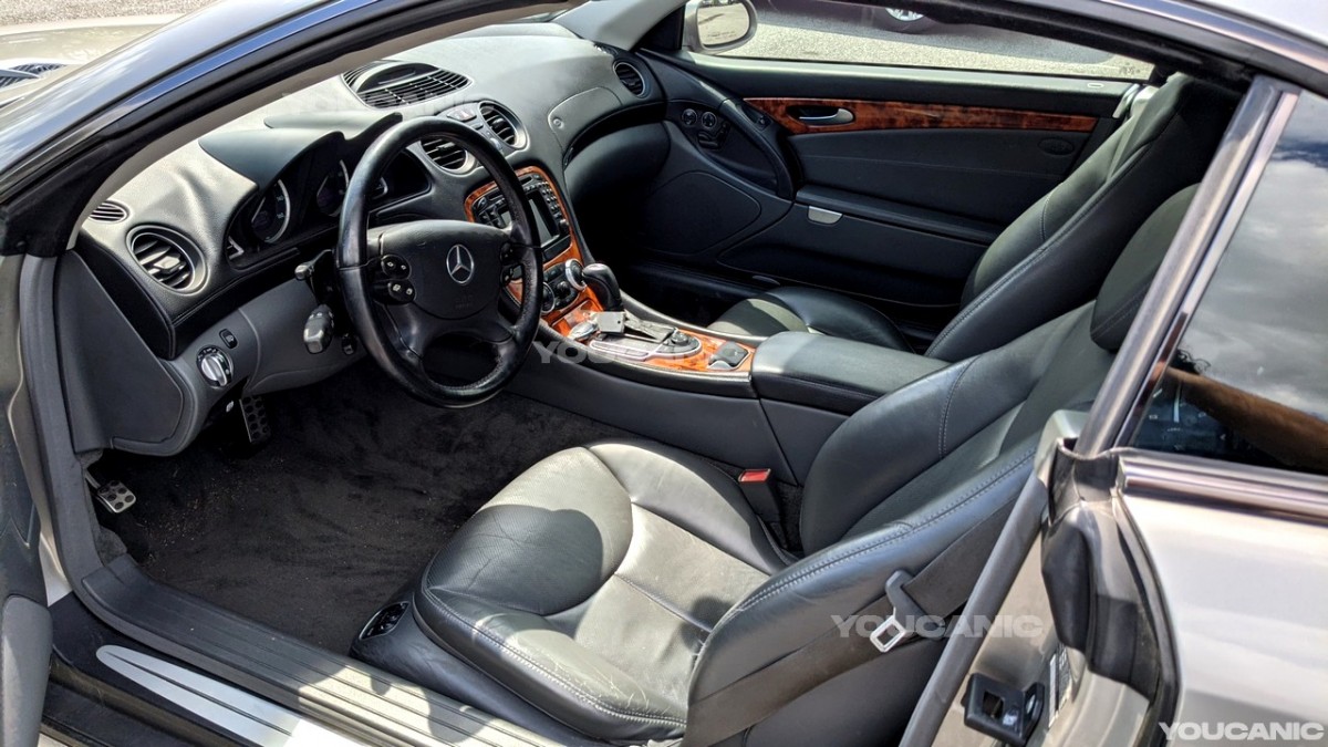 Going in the driver's seat to pull the hood release and trunk release.