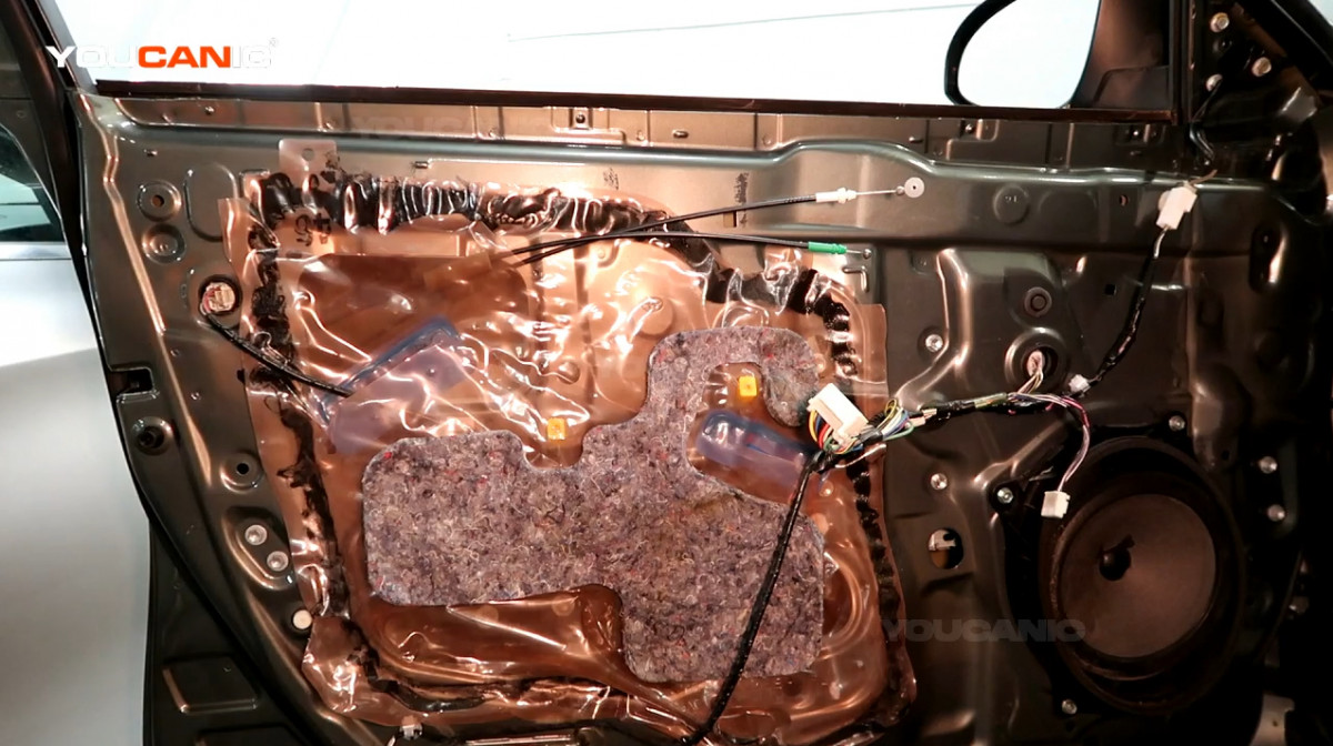 Removed door panel of the 2012 Toyota Camry.