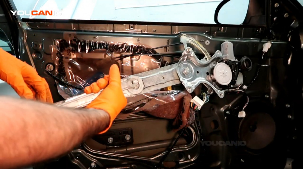 The window regulator on the driver's door.