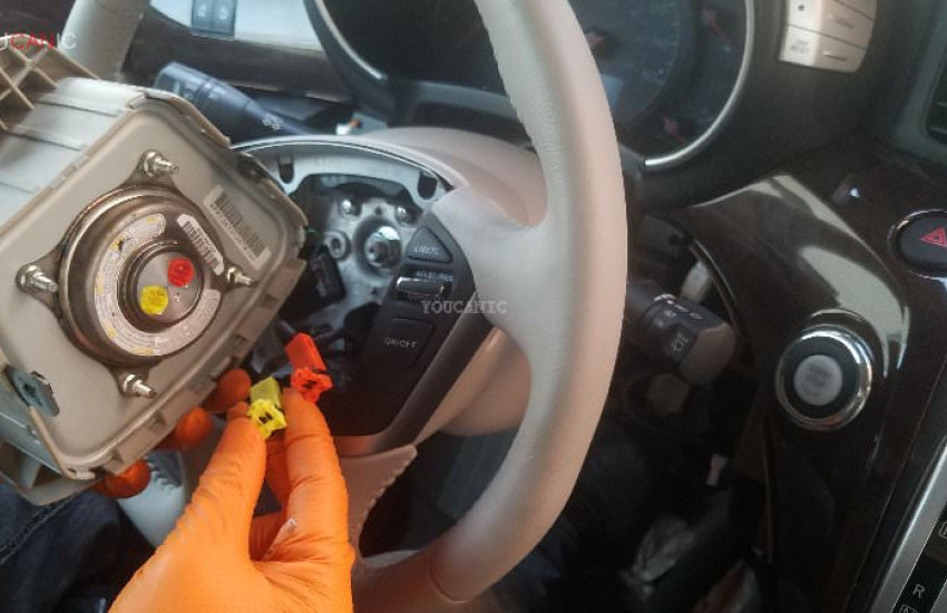 How to Replace Driver Steering Wheel Airbag on Nissan Quest