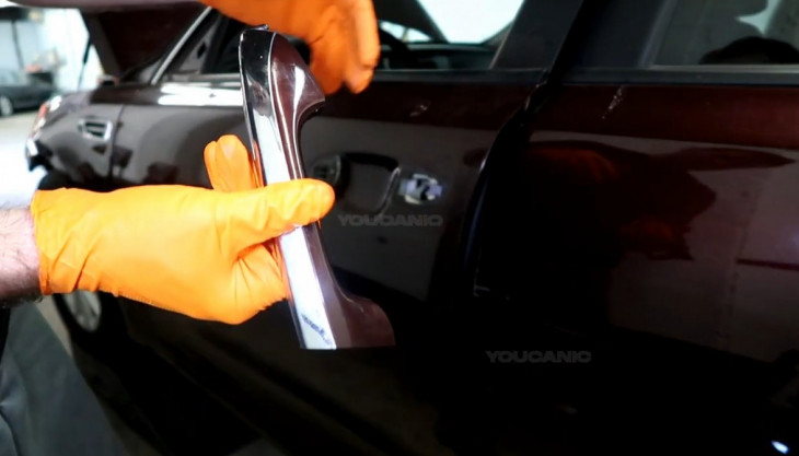 Replacing the door handle on a 2016-2020 Kia Optima.