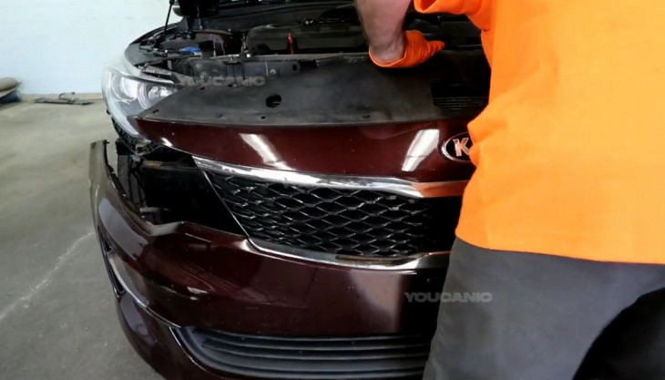 Removing the front bumper on a 2016-2020 Kia Optima.