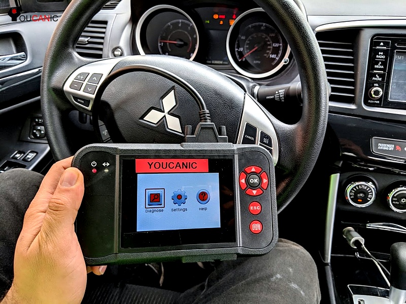 diagnose read fault codes mitsubishi service engine light soon on